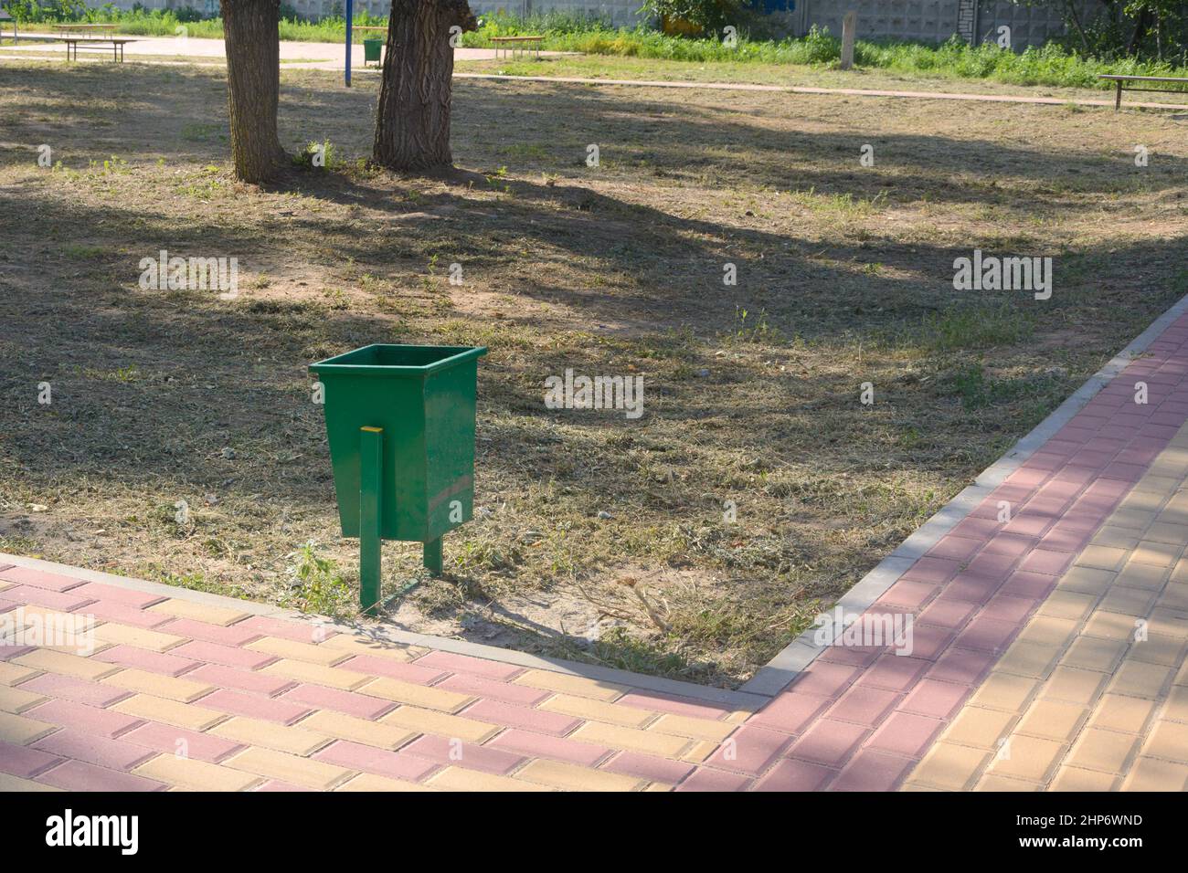 Iron urn in city park. Ecology concept. Stock Photo