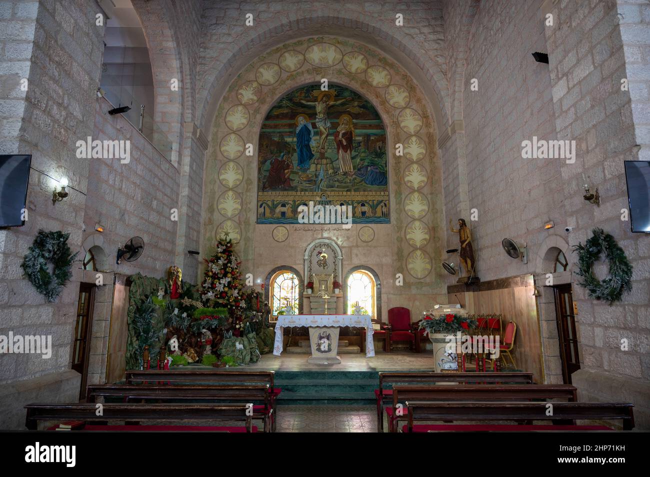 Altar and interior of Saint John the Baptist church in Madaba, Jordan Stock Photo