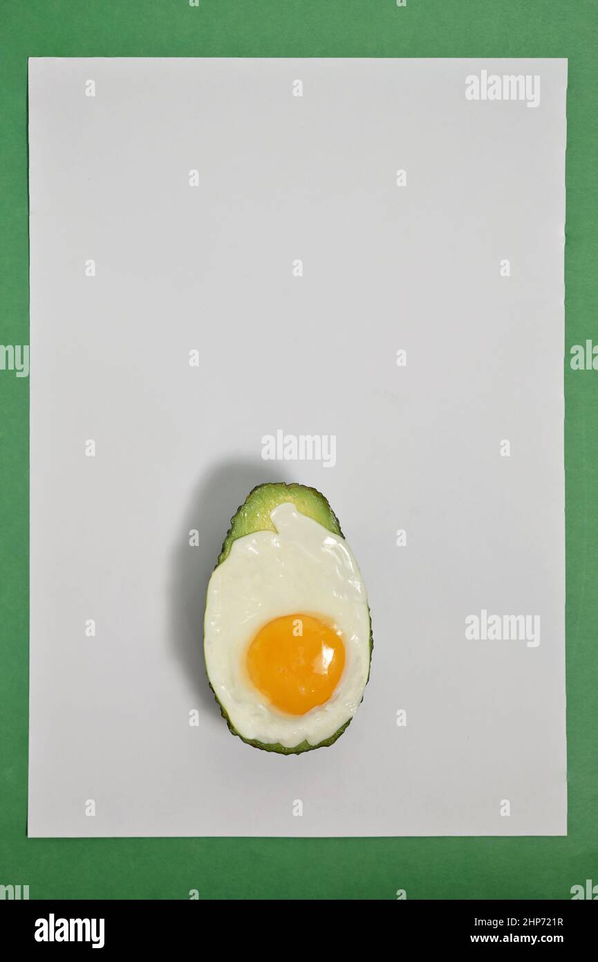 Closeup Abstract Fried Egg On Avocado Slice Stock Photo