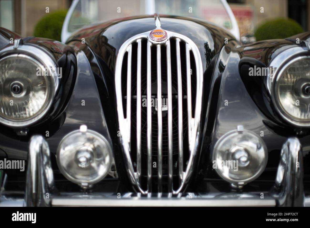 Front view of an old beautiful black vintage retro Jaguar car Stock Photo