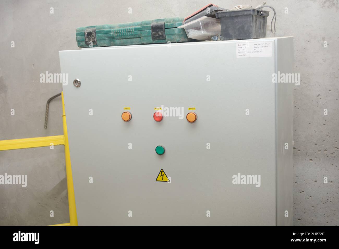 Electrical control cabinet. Closed door with indicators. Stock Photo
