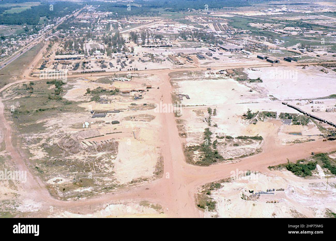 Aerial view of the Force Logistics Support Group, 3d MAF, and 3d MAW Headquarters taken from the south of DaNang looking north - September 1965 - PD Photo Courtesy of USMC Stock Photo