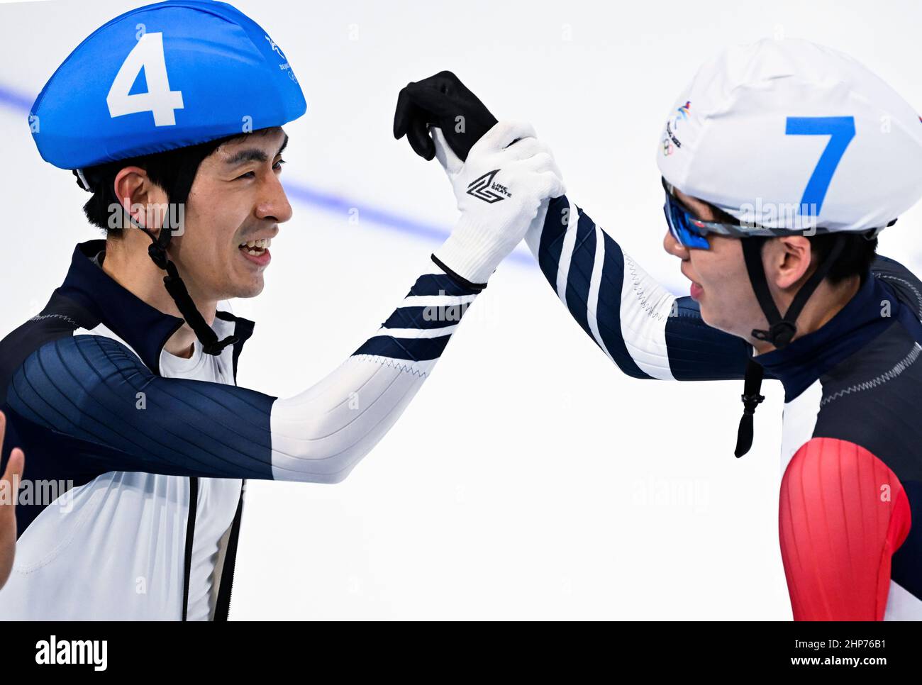 Beijing, China. 19th Feb, 2022. Lee Seung Hoon (L) and Jae Won Chung of South Korea celebrate after the speed skating men's mass start final of Beijing 2022 Winter Olympics at the National Speed Skating Oval in Beijing, capital of China, Feb. 19, 2022. Credit: Wang Fei/Xinhua/Alamy Live News Stock Photo