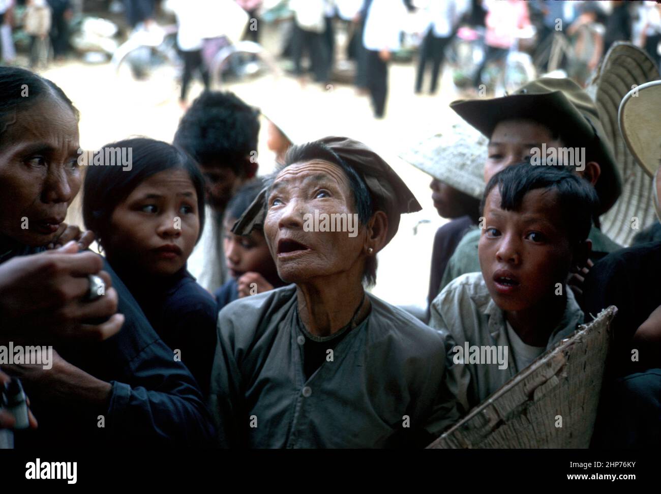 Vietnam War Photos: MEDCAP (Medical Civic Action Program) for the local population outside Hill 10 during the Vietnam War - local popluation awaiting medical treatment - PD photo courtesy of USMC Stock Photo