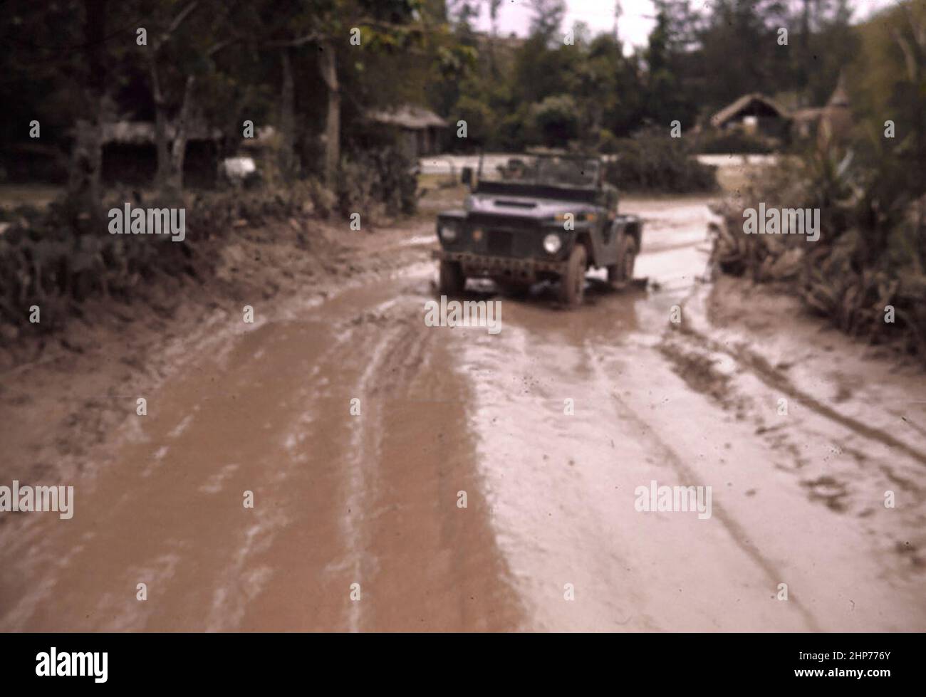 A mighty-mite traversing the main MSR between Chu Lai to 2d Battalion, 4th Marines south of Chu Lai after 2 days of rain - September 1965 - PD Photo courtesy of USMC Stock Photo