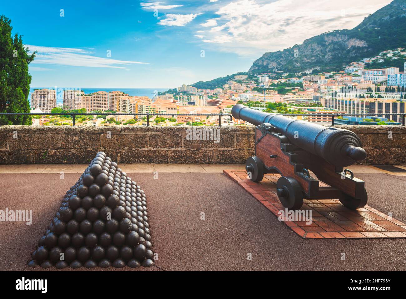 Cannon and cannonballs along Monaco wall ramparts and fort. Montecarlo, Monaco principality, Europe Stock Photo