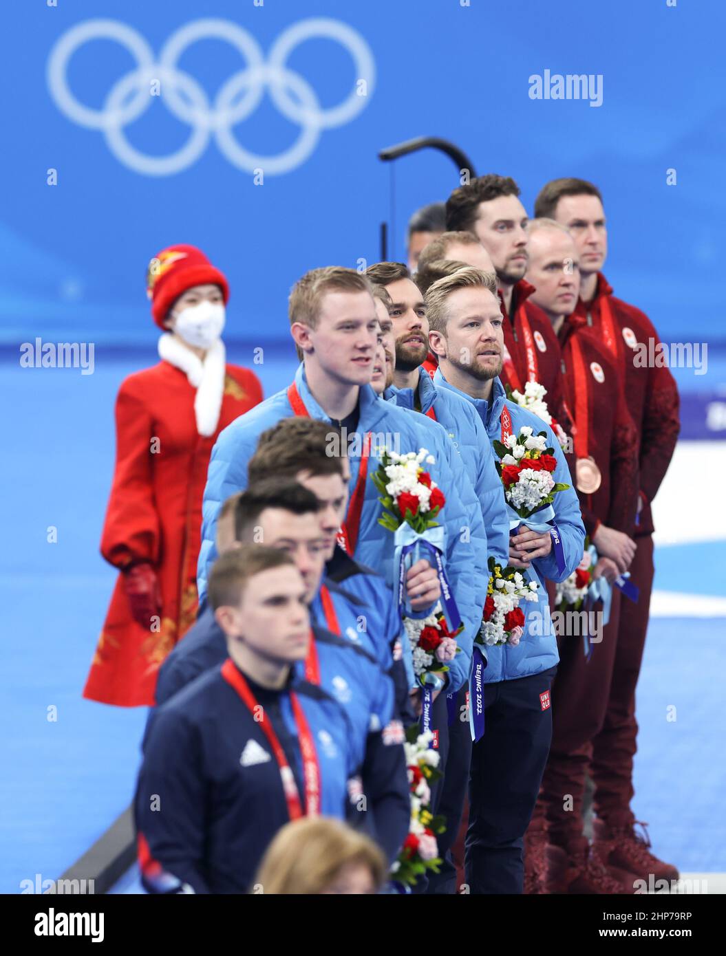 Beijing, China. 19th Feb, 2022. Medalists react during the awarding ceremony of curling men's event of Beijing 2022 Winter Olympics at National Aquatics Centre in Beijing, capital of China, Feb. 19, 2022. Credit: Wang Jingqiang/Xinhua/Alamy Live News Stock Photo