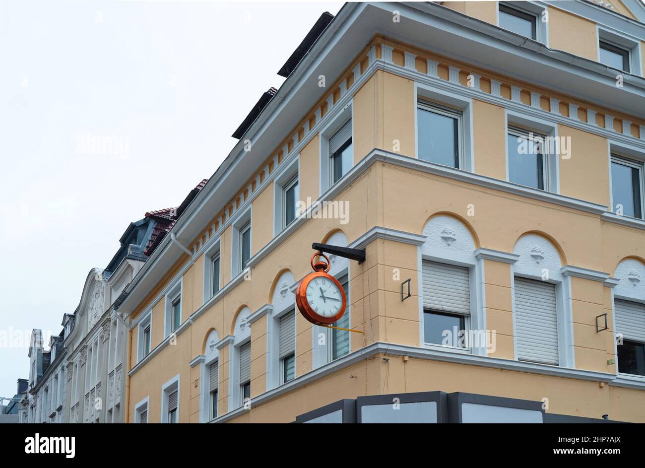 Huge golden pocket watch used as a clock. It's part of a jewellery shop. Stock Photo