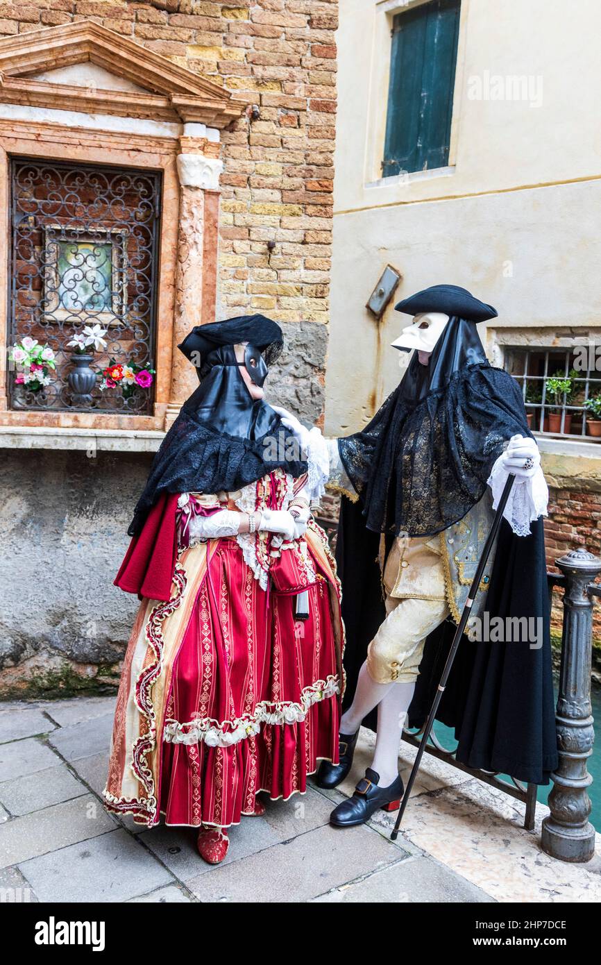 Venice, Italy. 19 February 2022. Despite the ongoing Corona pandemic, the Carnival in Venice attracts many people in  colourful costumes and tourists. Credit: 51North/Alamy Live News Stock Photo