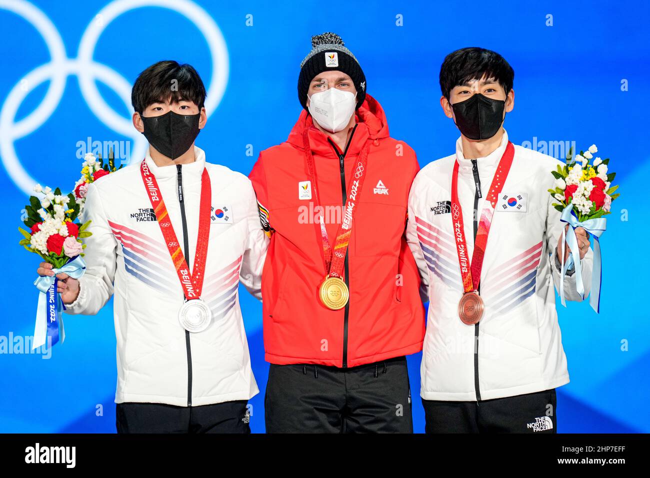 Beijing, China. 19th Feb 2021. BEIJING, CHINA - FEBRUARY 19: Jae Won Chung of Korea winner of the silver medal, Bart Swings of Belgium winner of the gold medal, Seung Hoon Lee of Korea winner of the brons medal of the Speed Skating Men's Mass Start - Medal Ceremony during the Beijing 2022 Olympic Games at the Medal Plaza on February 19, 2022 in Beijing, China (Photo by Douwe Bijlsma/Orange Pictures) NOCNSF Credit: Orange Pics BV/Alamy Live News Stock Photo