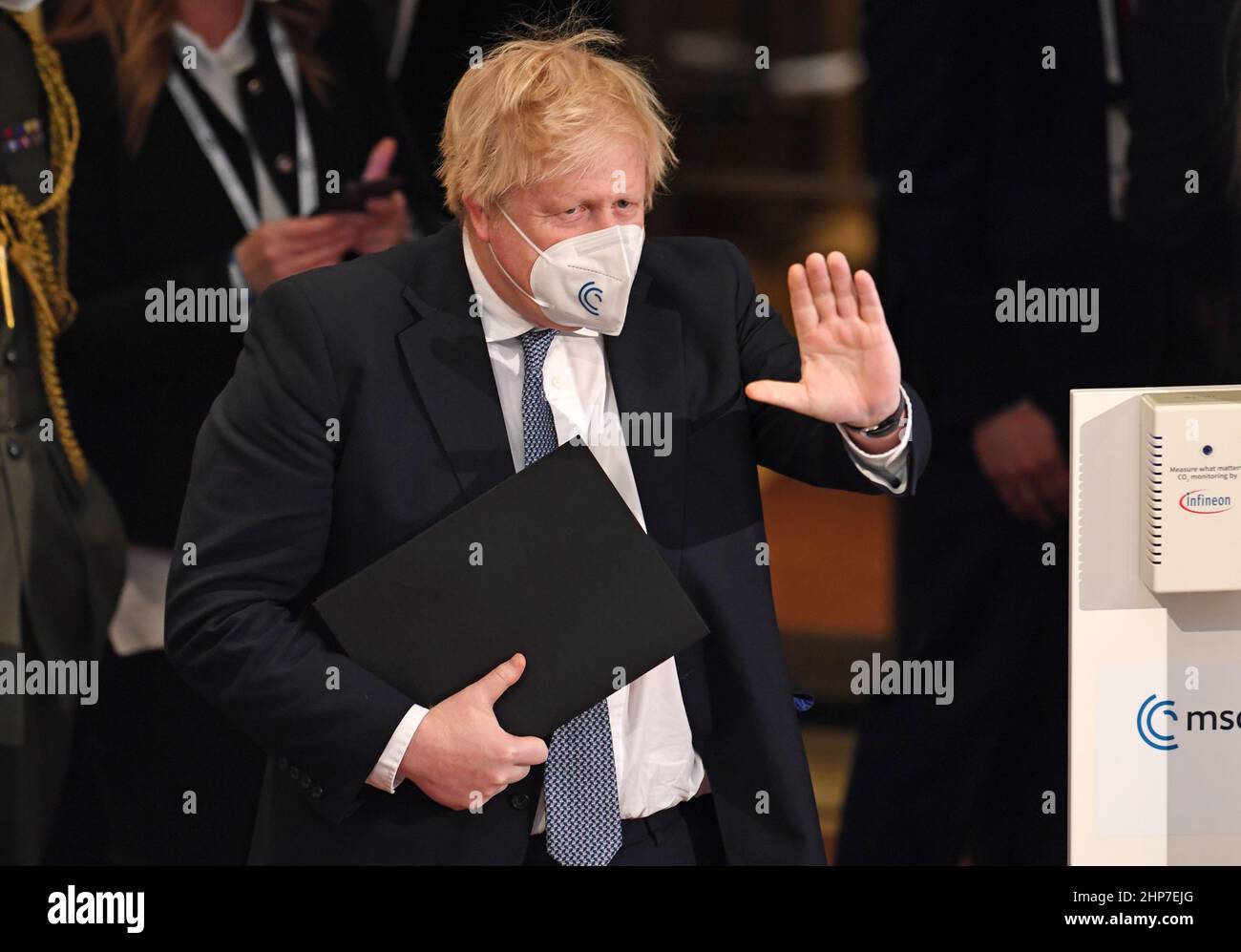 Munich, Germany. 19th Feb, 2022. Boris Johnson, bitish prime minister, waves at the 58th Munich Security Conference. The security conference will take place from Feb. 18 to 20, 2022, at the Bayerischer Hof Hotel. Credit: Tobias Hase/dpa/Alamy Live News Stock Photo