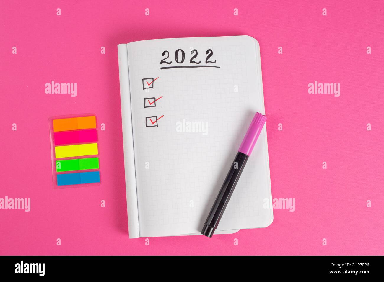 To do list for 2022 in notebook plan. Top view, flat lay, copy space. Planning working week concept, plan, checklist, to do list idea Stock Photo