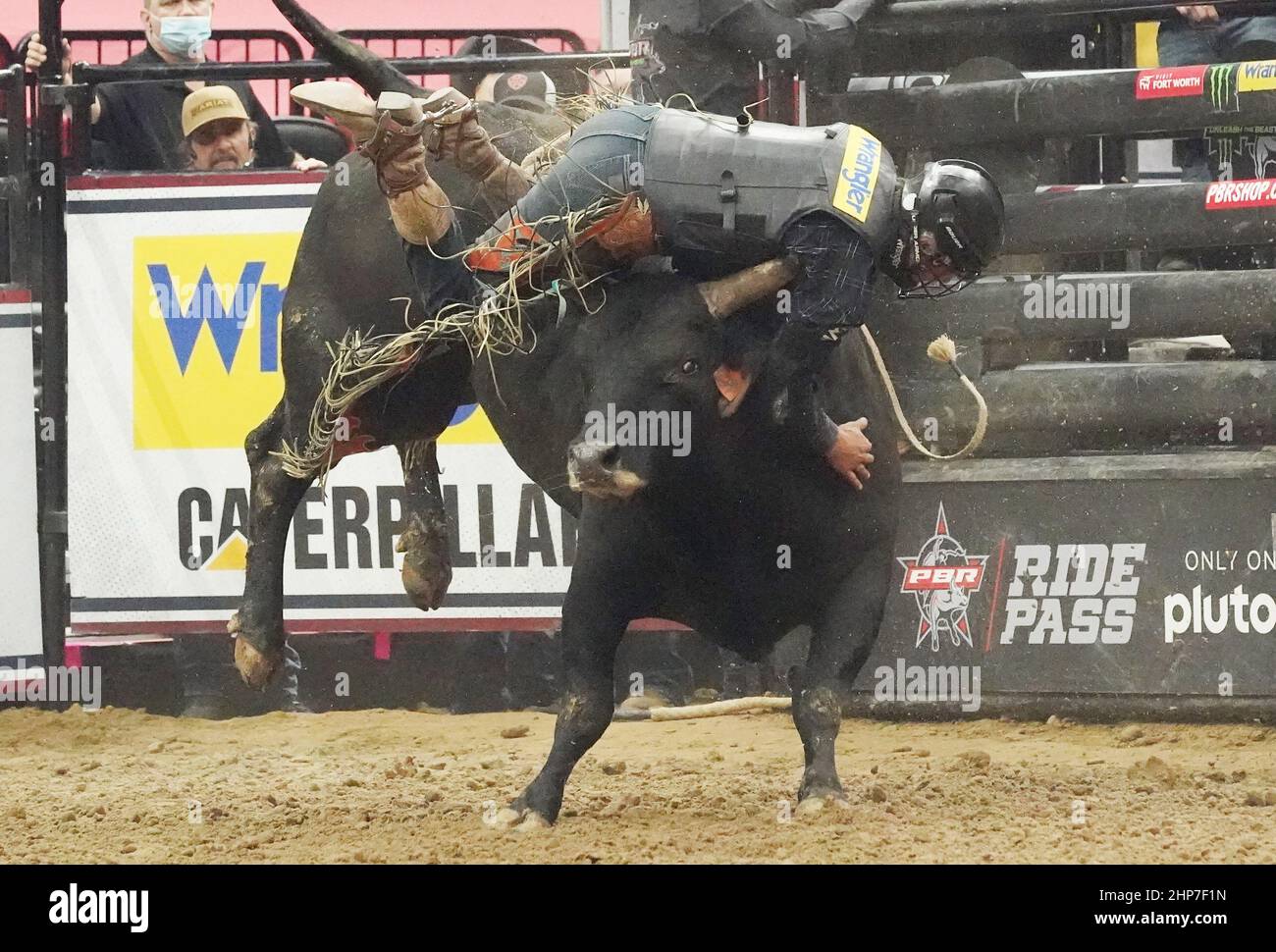 St. Louis, United States. 18th Feb, 2022. Bull Rider Dakota Louis falls ...
