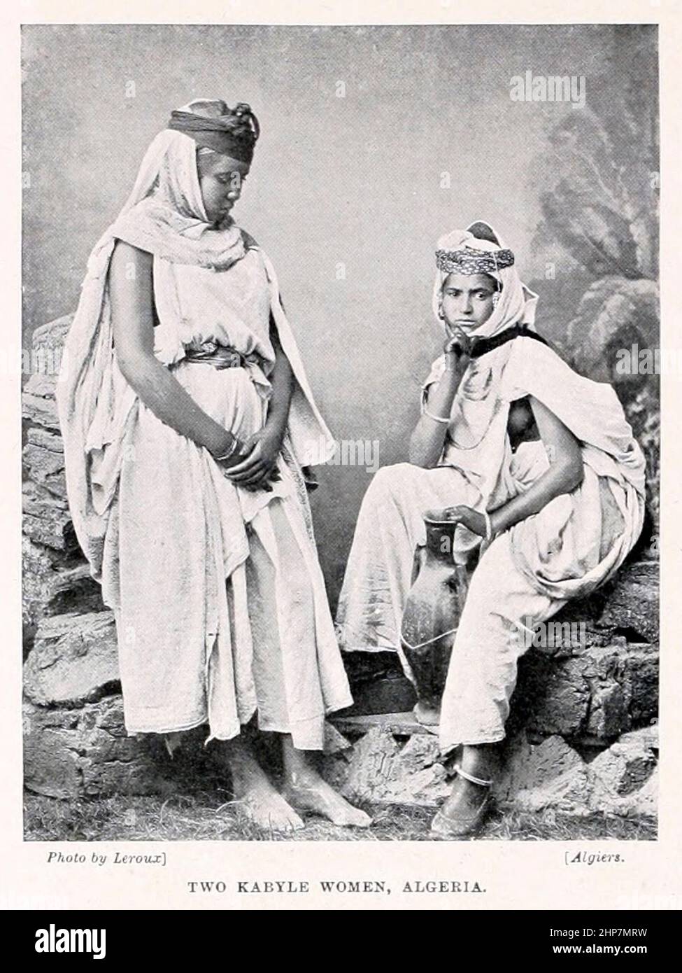 Two Kabyle women, The Kabyle people are a Berber ethnic group indigenous to Kabylia in the north of Algeria, spread across the Atlas Mountains, one hundred miles east of Algiers. They represent the largest Berber-speaking population of Algeria and the second largest in North Africa. Algeria From the book The living races of mankind; Volume 2 by Henry Neville Hutchinson, Published in London in 1901 by Hutchinson & co Stock Photo