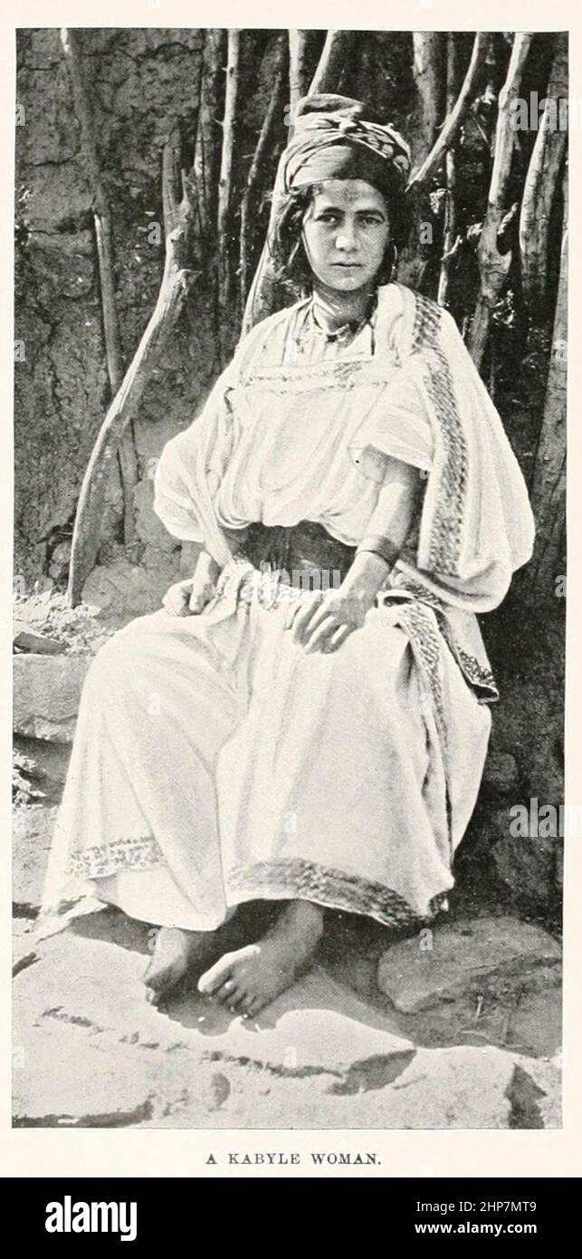 A Kabyle woman The Kabyle people are a Berber ethnic group indigenous to Kabylia in the north of Algeria, spread across the Atlas Mountains, one hundred miles east of Algiers. They represent the largest Berber-speaking population of Algeria and the second largest in North Africa. From the book The living races of mankind; Volume 2 by Henry Neville Hutchinson, Published in London in 1901 by Hutchinson & co Stock Photo