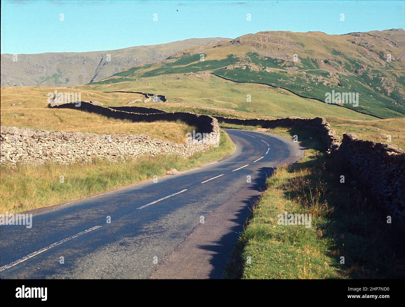 Curvy country road in Scotland, Great Britain. Stock Photo