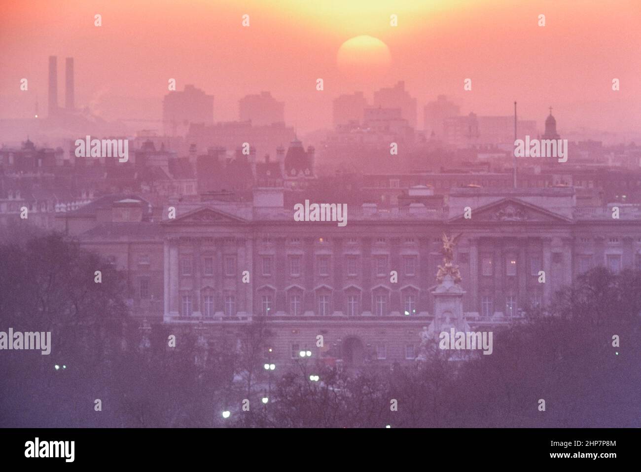Sunset behind Buckingham Palace and the Victoria Memorial. London. England. UK. Circa 1980's Stock Photo