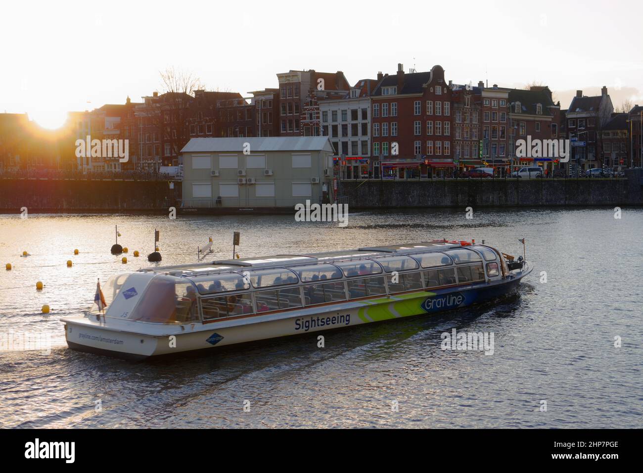 Sightseeing boat in winter Amsterdam, Netherlands Stock Photo