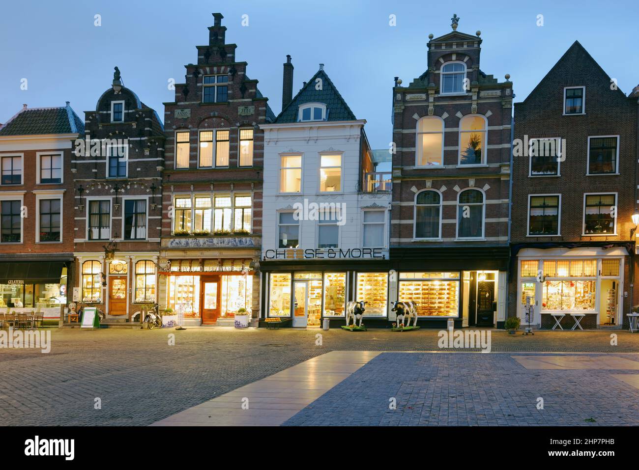 Night view to cafes and shops at the Markt, the largest historic market squares in Europe, located in Delft, South Holland, Netherlands Stock Photo