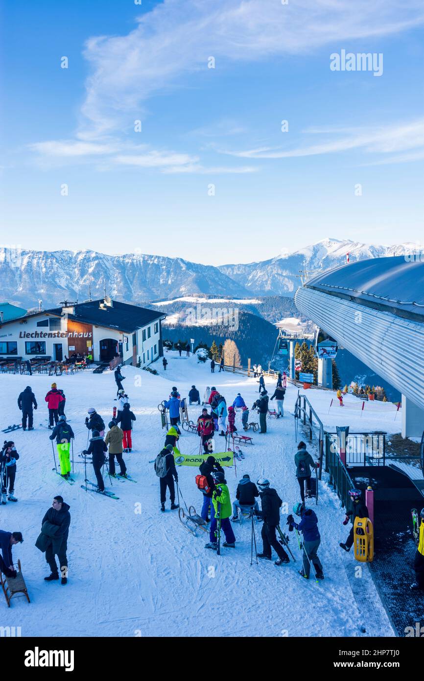 Semmering: Ski area Zauberberg Semmering - Hirschenkogel, downhill skiing,  skiers, mountain station ski lift, view to mountain Schneeberg, restaurant  Stock Photo - Alamy