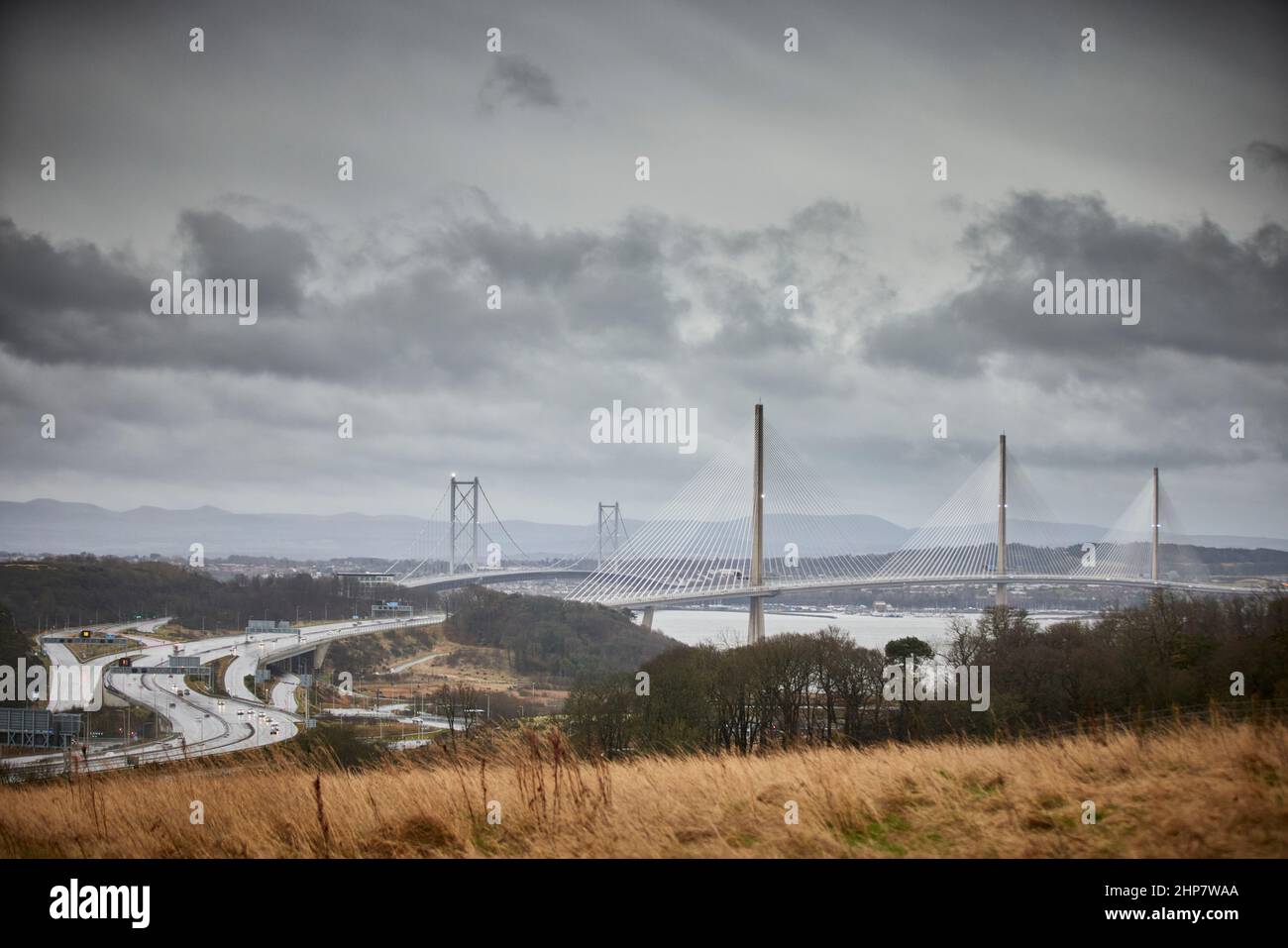The Queensferry Crossing from Inverkeithing with the older Forth Road Bridge middle Stock Photo