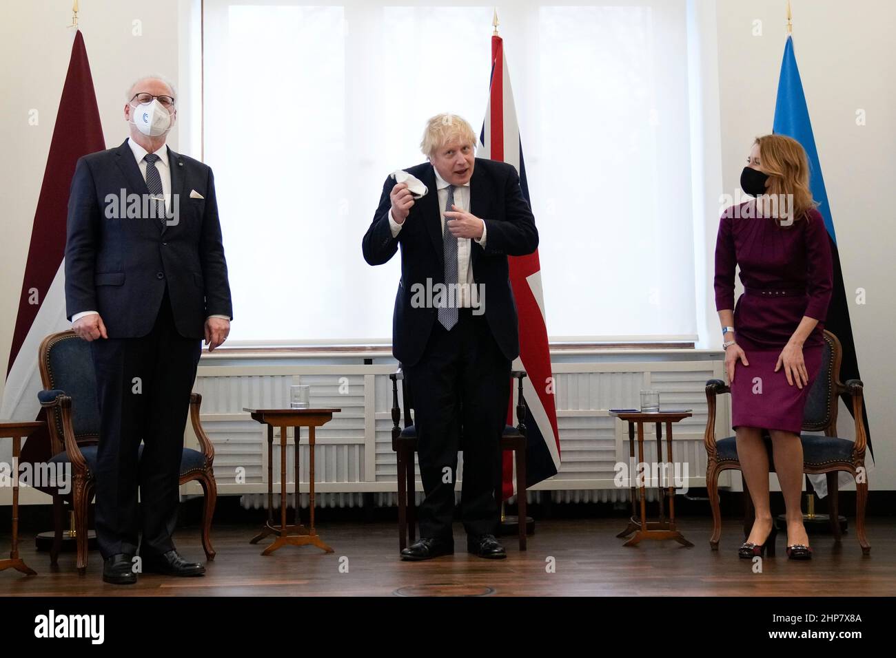 Prime Minister Boris Johnson (centre), meets with Estonia's Prime Minister Kaja Kallas and Latvian President Egils Levits at the Munich Security Conference in Germany where the he is meeting with world leaders to discuss tensions in eastern Europe. Picture date: Saturday February 19, 2022. Stock Photo