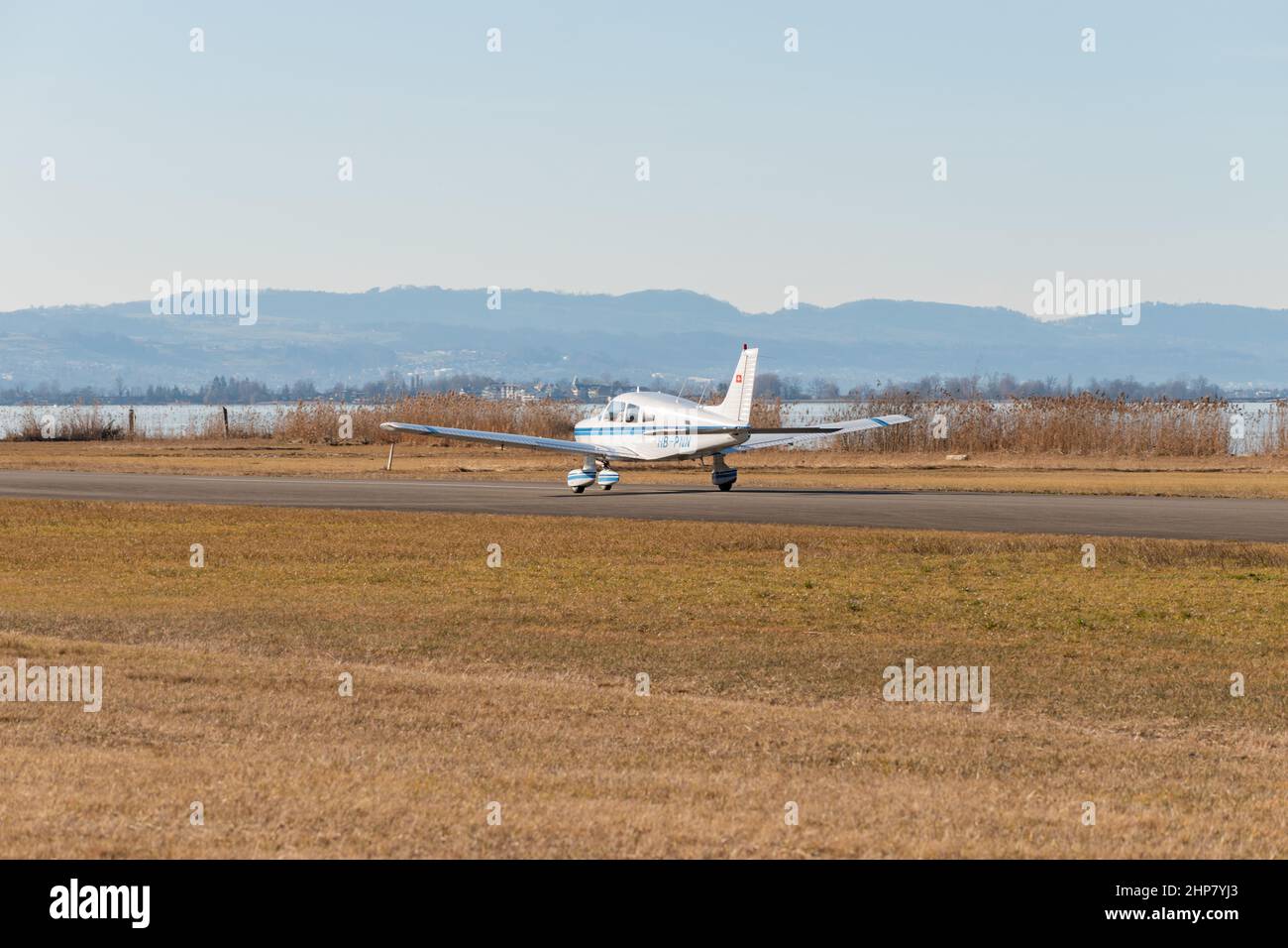 Wangen-Lachen, Switzerland, February 13, 2022 Piper PA-28-161 Warrior II is arriving on a small airfield Stock Photo
