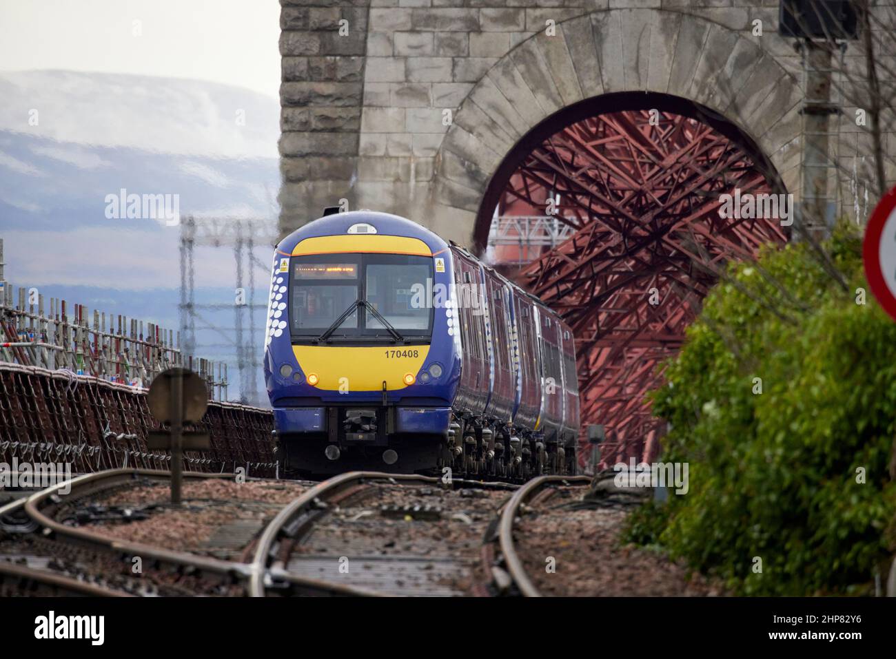 Scotrail Class 170 train approaching  the Forth Bridge departed from   North Queensferry railway station Stock Photo