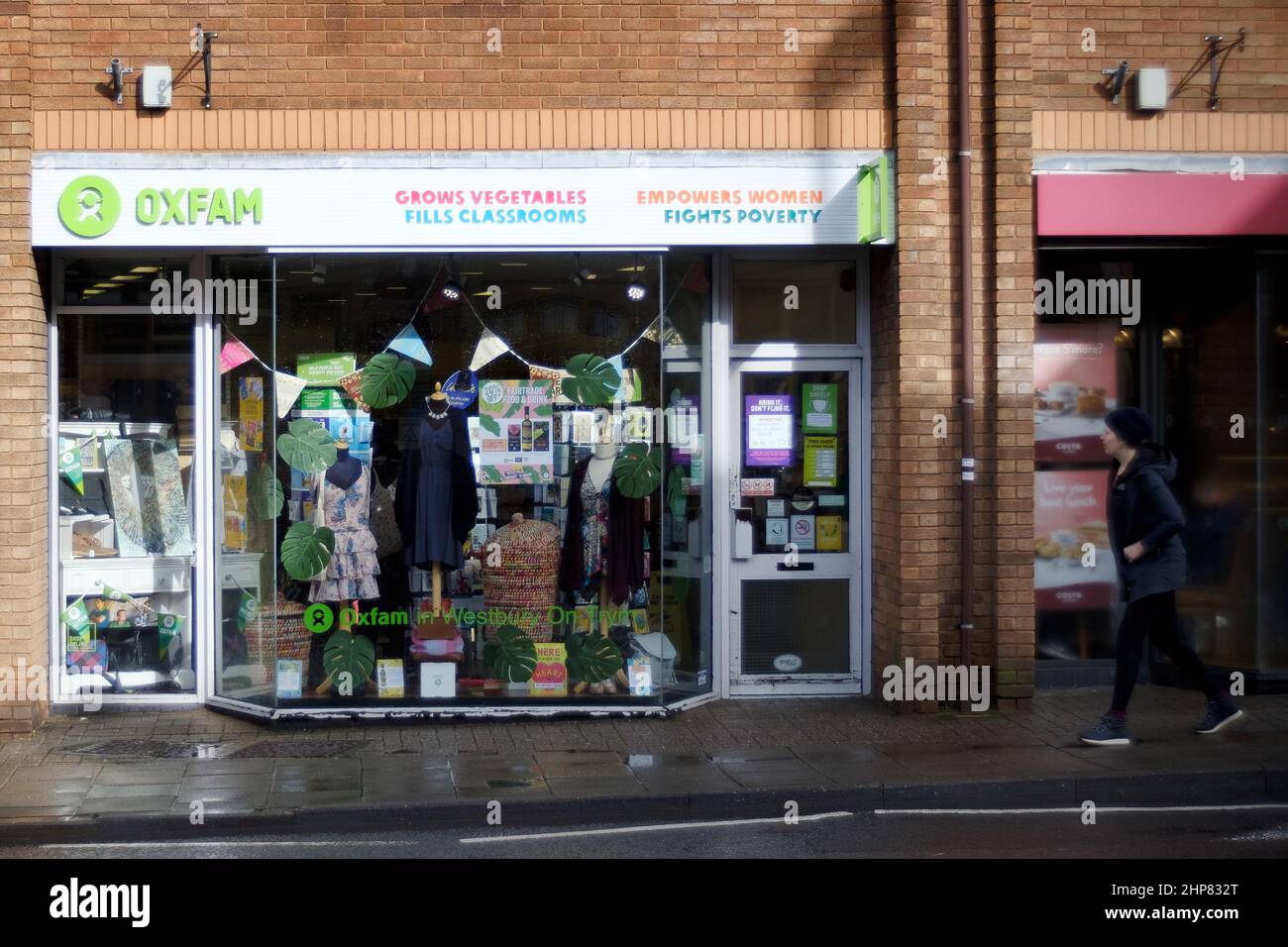 A UK Oxfam High Street Charity shop. The retail shops raise money for the charity by selling charitable donations given to them by the public Stock Photo