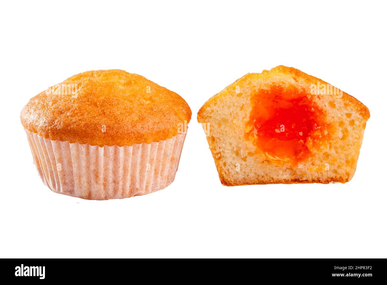 Soft and moist muffin with apricot jam filling isolated on white Stock