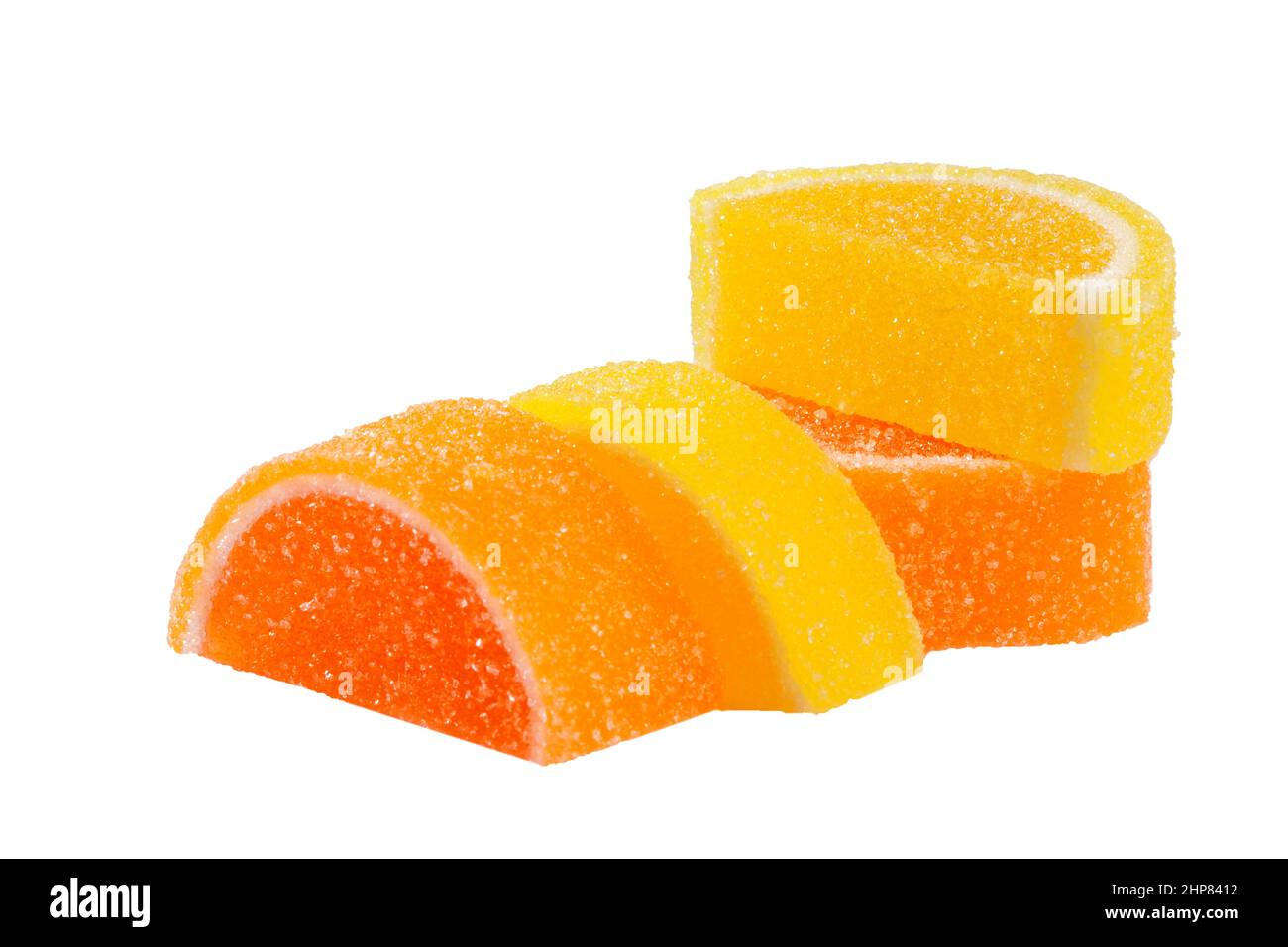 Gummy candies shaped like lemon and orange slices on white background