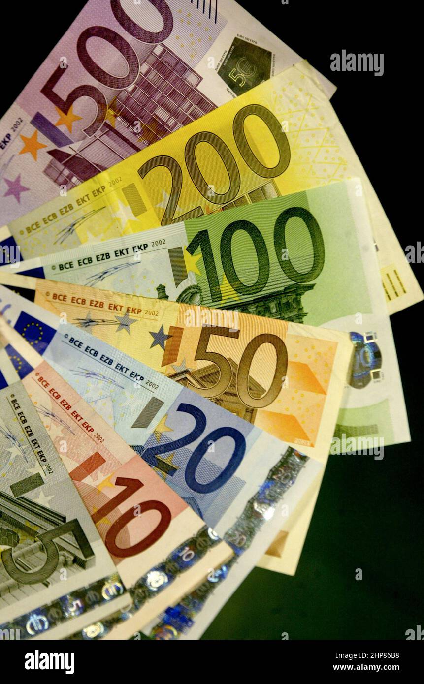Different euro banknotes in a bank. The euro (symbol €; code EUR) is