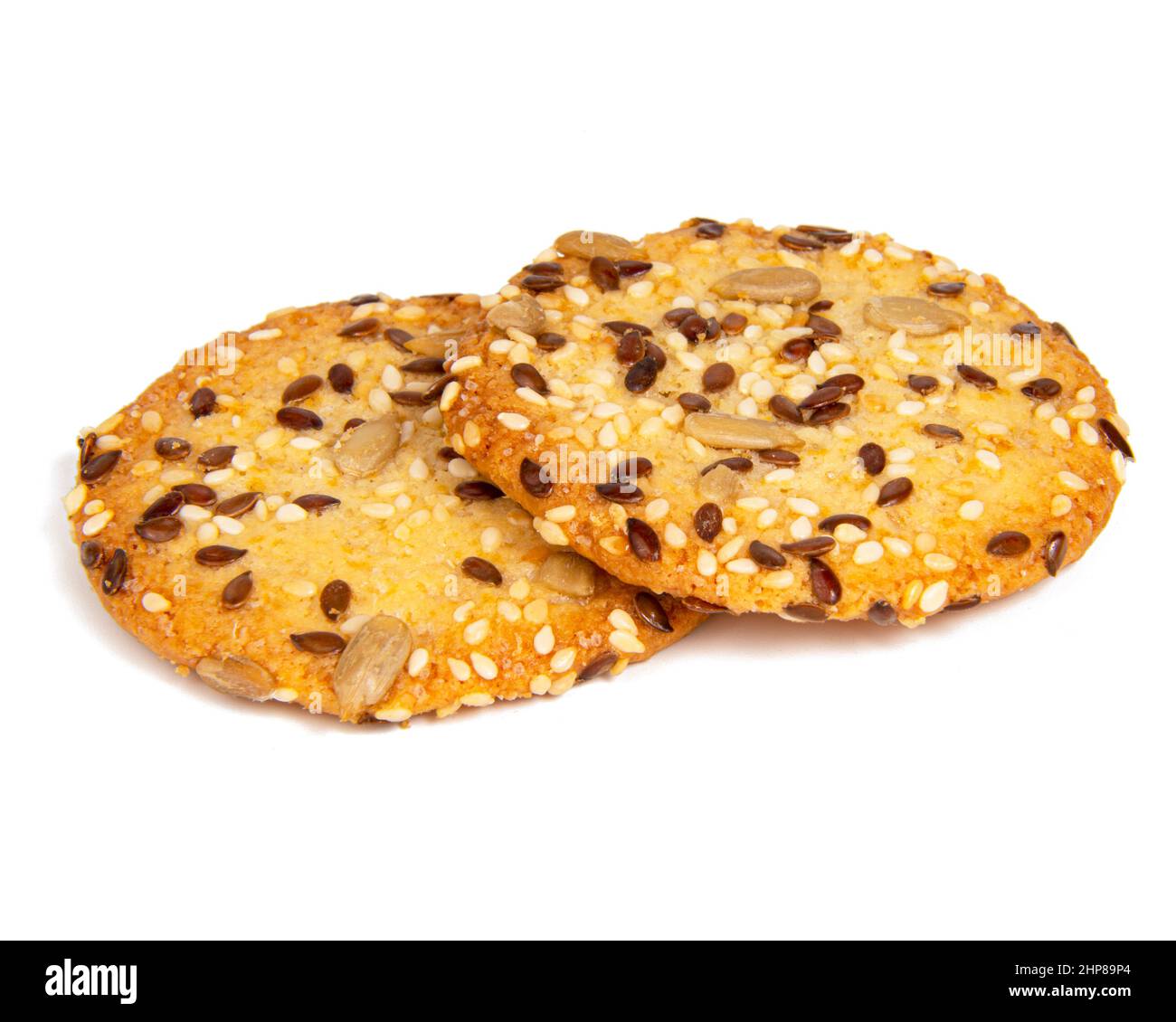 Whole grain snack cereal cookies with seeds isolated on the white background Stock Photo