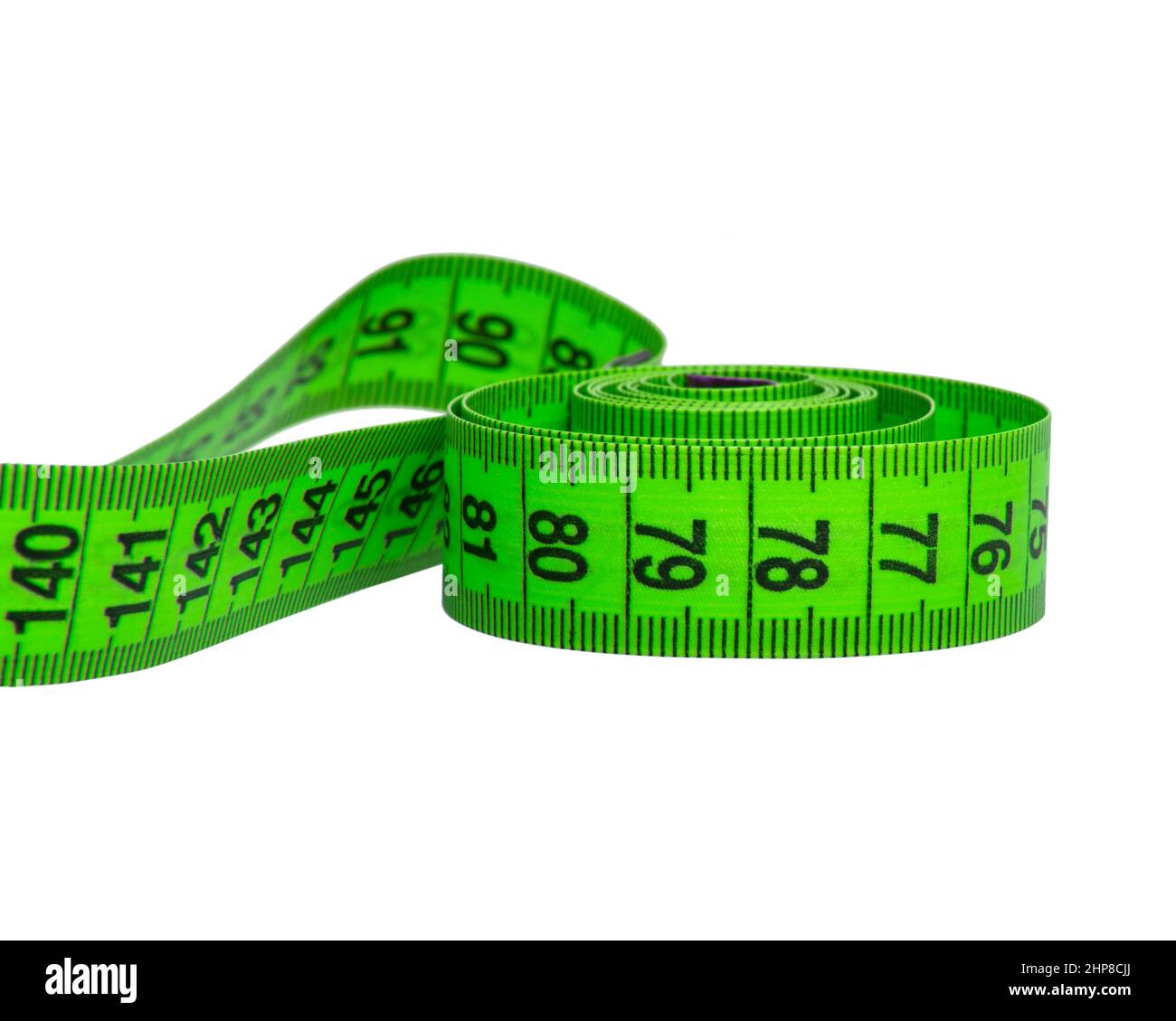 Green bright tape measure tool isolated on the white background Stock Photo