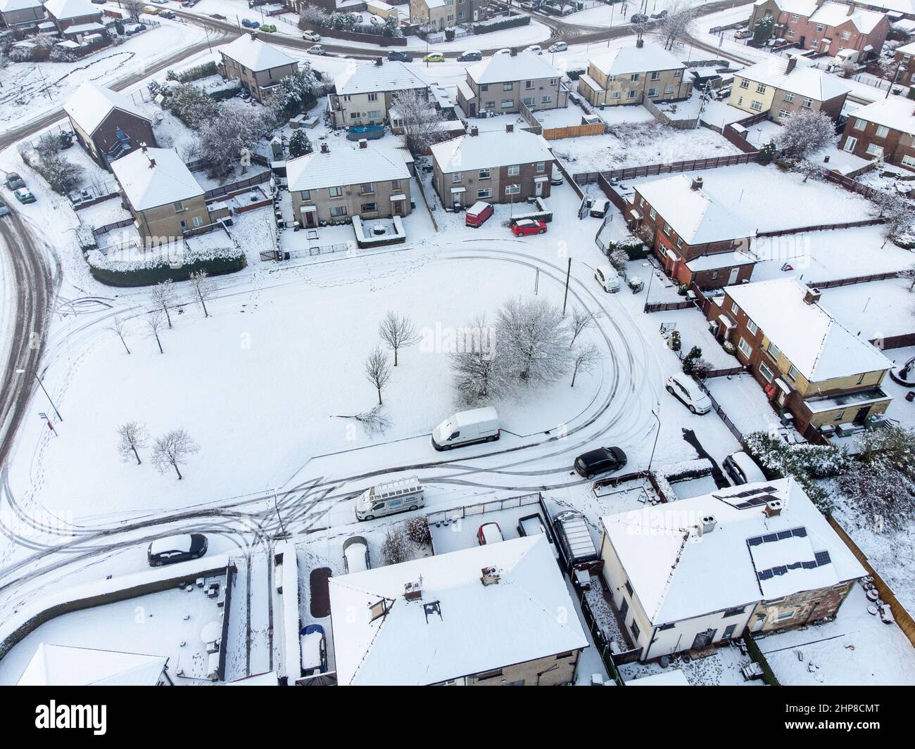 Aerial view of snow covered Buttershaw council estate, Bradford, West Yorkshire, UK. 19th Feb 2022. Stock Photo