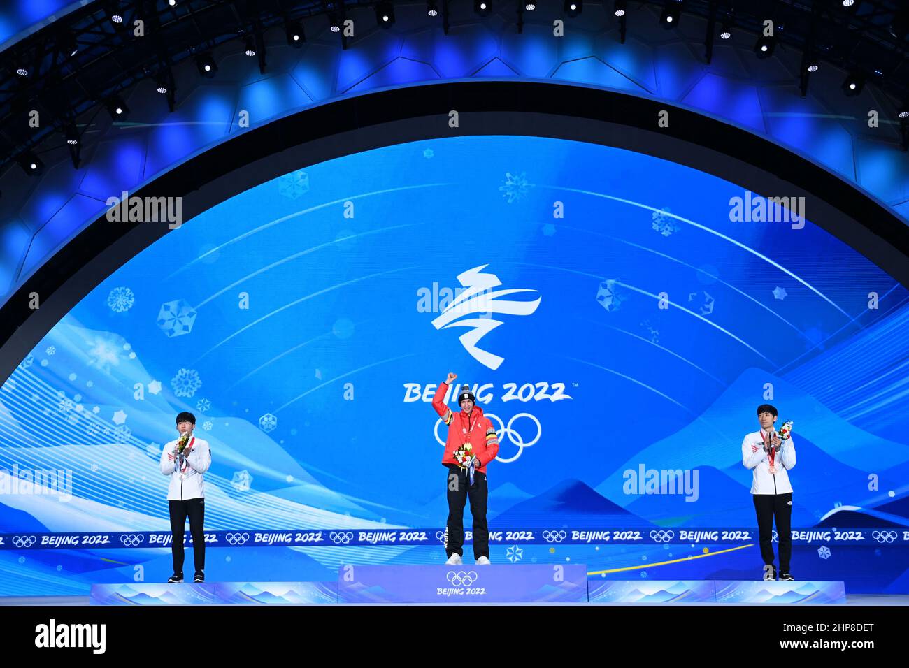Beijing, China. 19th Feb, 2022. Gold medalist Bart Swings (C) of Belgium, silver medalist Chung Jae Won (L) of South Korea and bronze medalist Lee Seung Hoon of South Korea pose during the awarding ceremony of speed skating men's mass start at the Beijing Medals Plaza of the Winter Olympics in Beijing, capital of China, Feb. 19, 2022. Credit: Huang Zongzhi/Xinhua/Alamy Live News Stock Photo