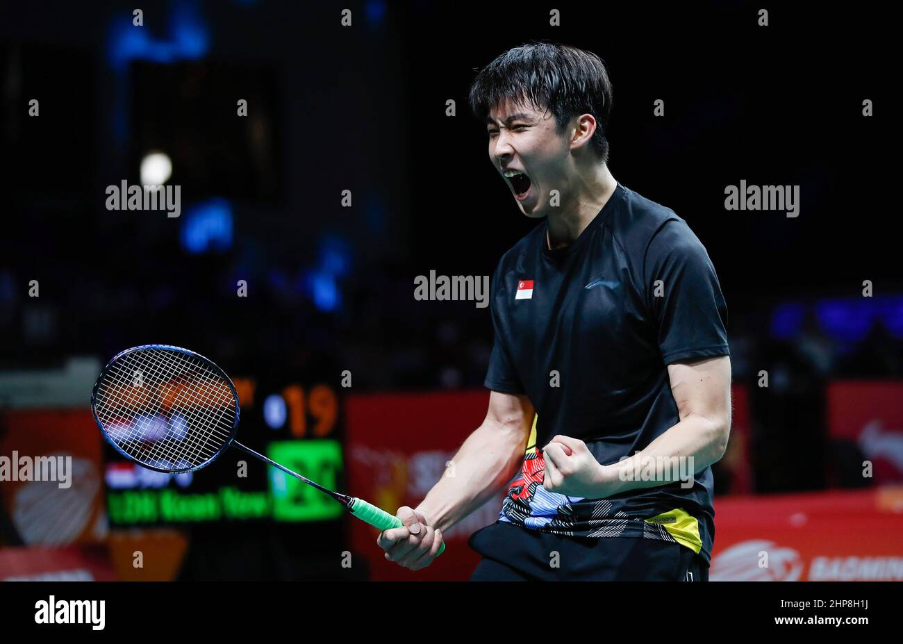 Loh Kean Yew of Singapore celebrates after winning the match against Dwi Wardoyo Chico Aura of Indonesia during the team mens singles match at the Badminton Asia Team Championships 2022 in Shah
