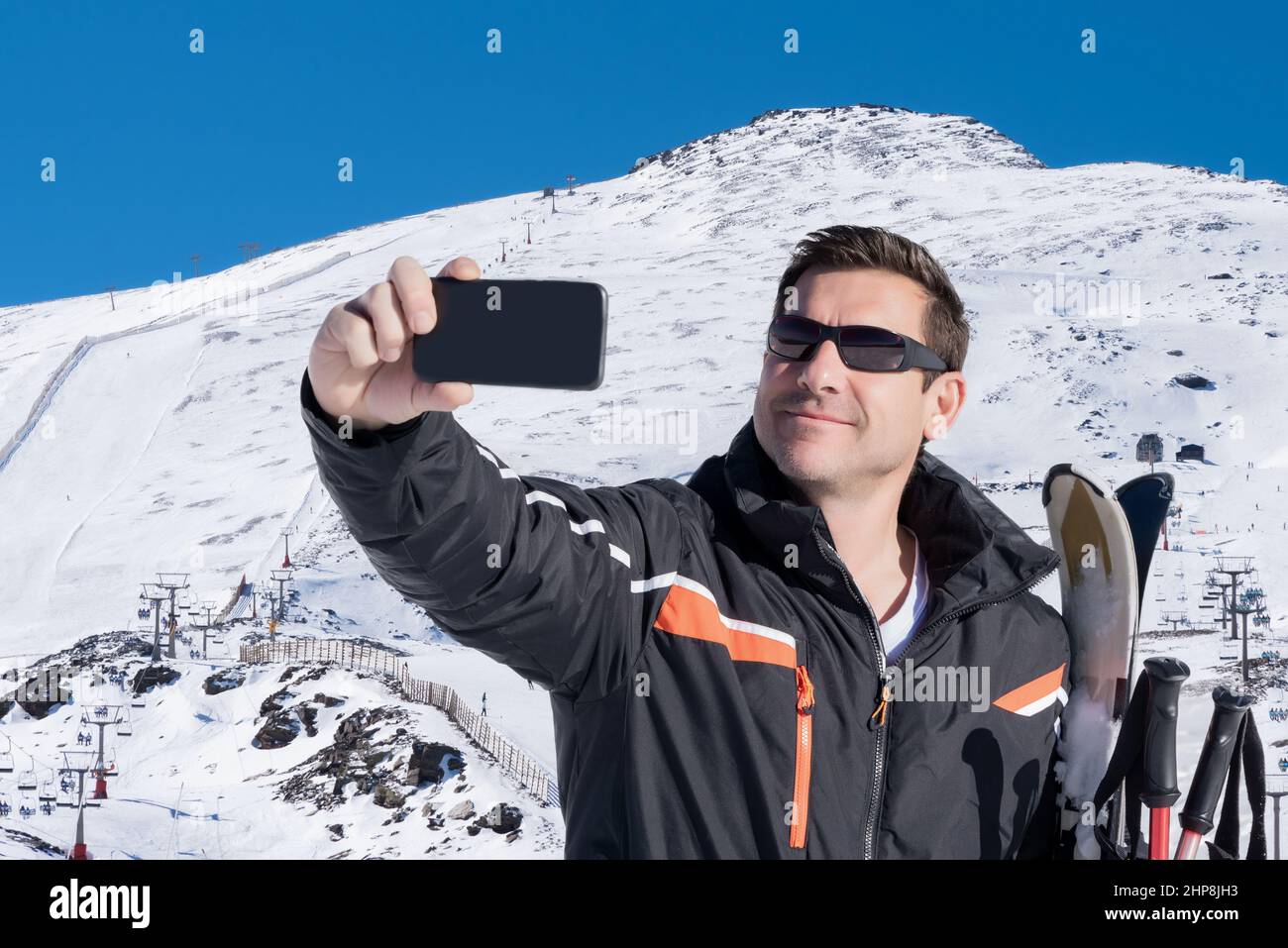 Taking selfie on ski slope hi-res stock photography and images - Alamy
