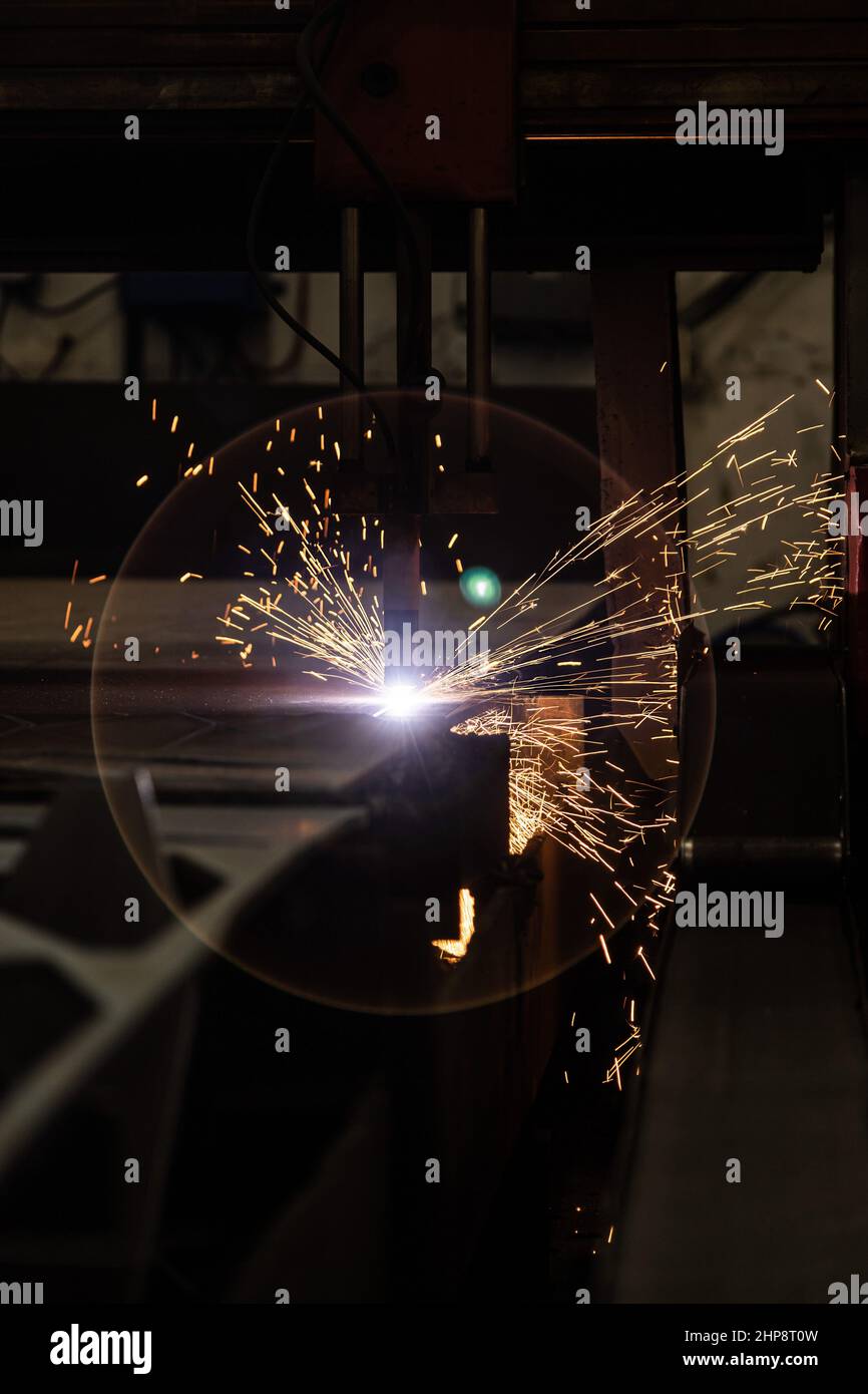 Plasma welding and metal cutting in industry. High-tech production processes at the plant Stock Photo