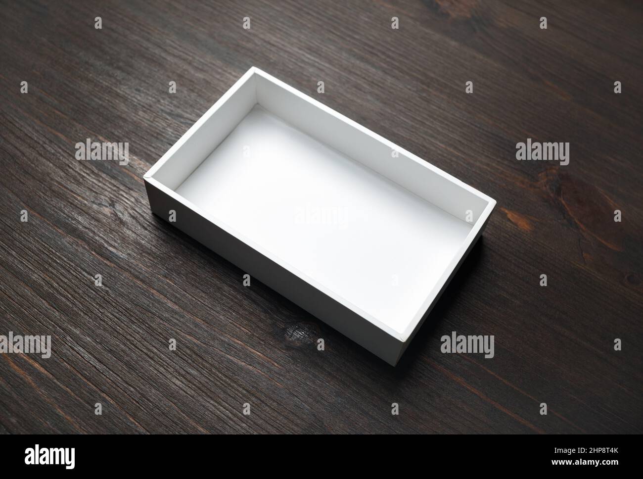 Blank box container template on wood table background Stock Photo - Alamy