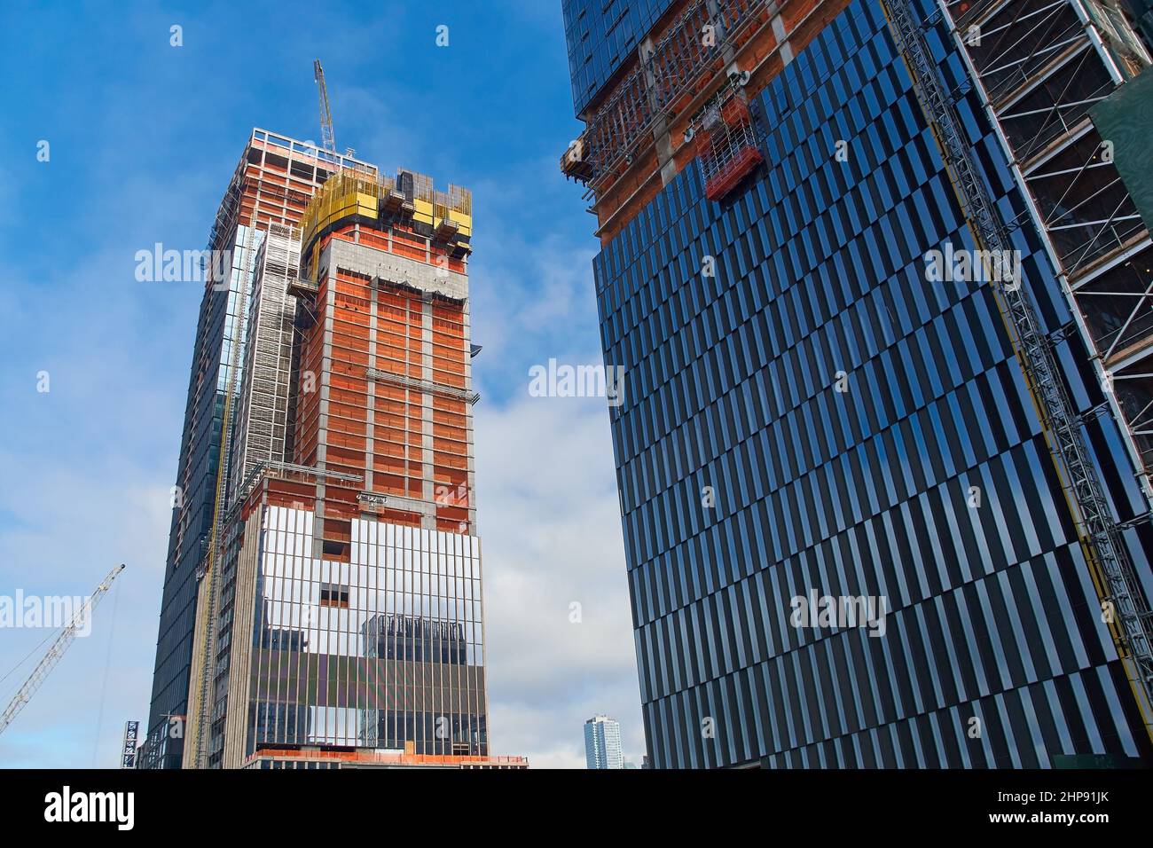 Skyscrapers under construction in New York city at daytime Stock Photo