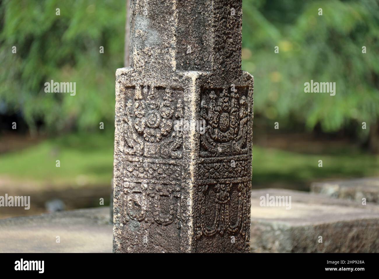 Carved stone pillar at Polonnaruwa in Sri Lanka Stock Photo