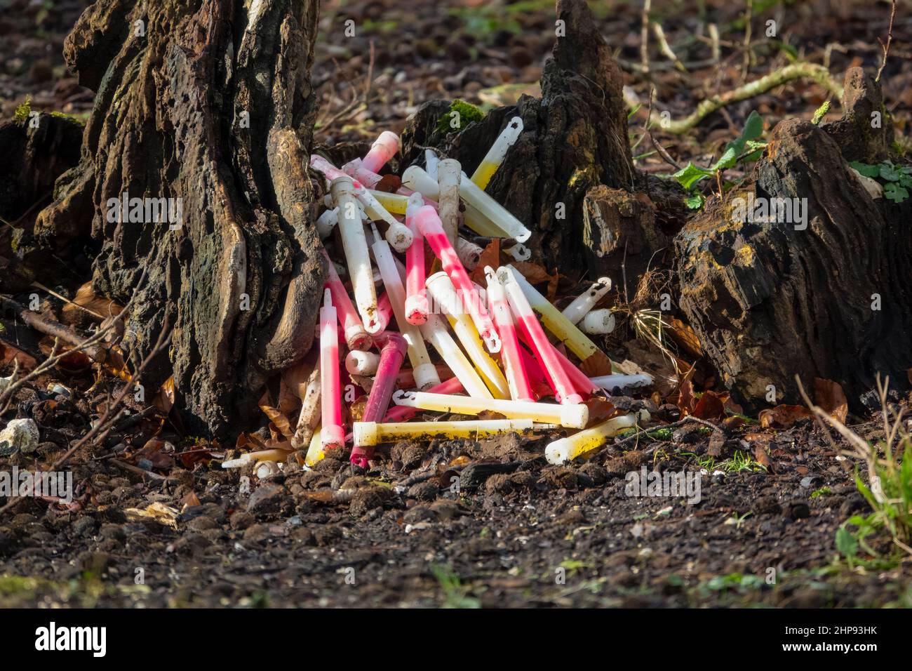close up of a collection of used army chem glow light sticks after a