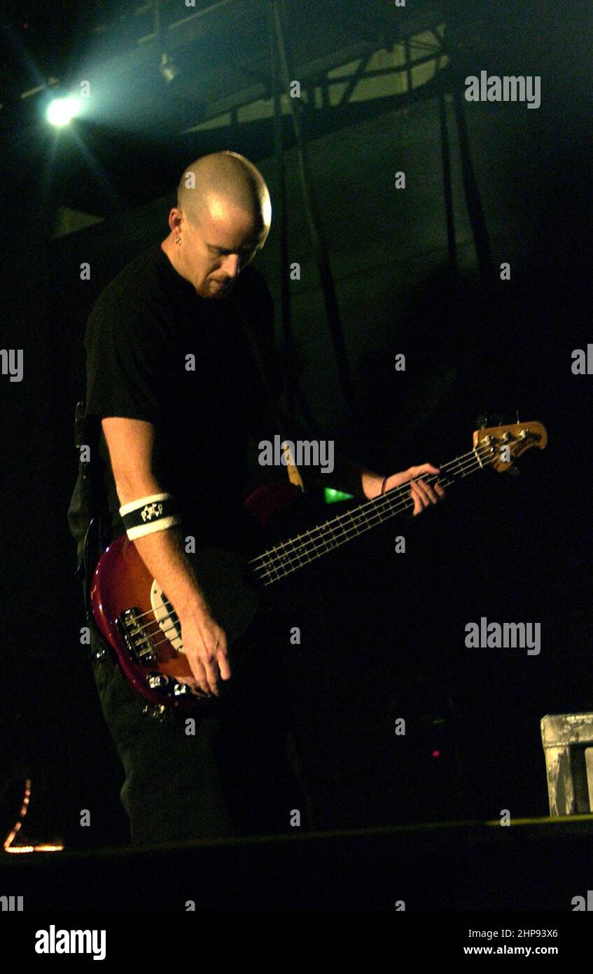 Milan Italy 2002-02-23 : Live concert by the American band Linkin Park at the Alcatraz nightclub,the bassist David Michael Farrell “Phoenix” during the concert Stock Photo