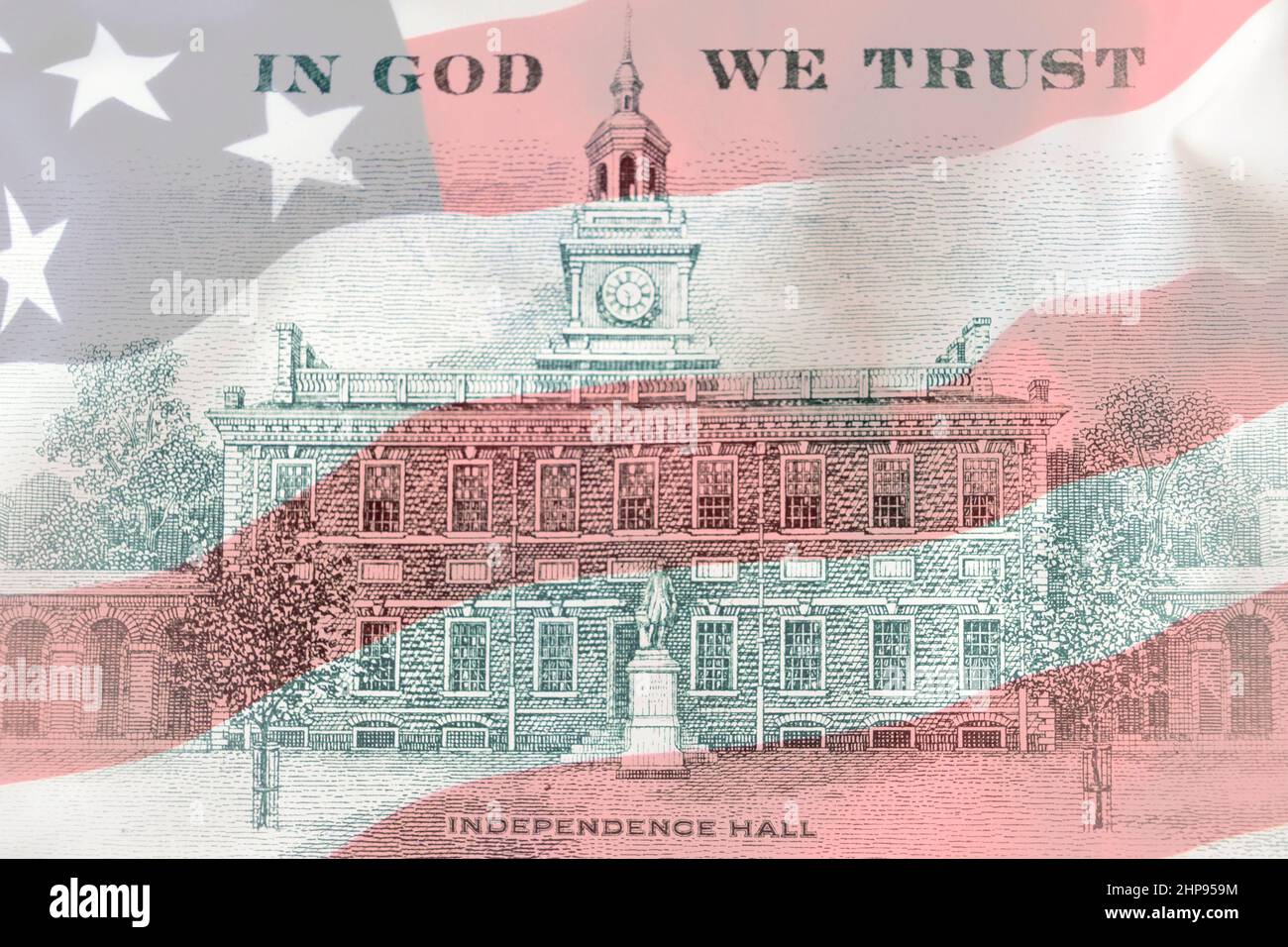US 100 dollar bill back side close up on american flag background. Hundred dollars bill Independence Hall fragment on macro. Macro shot Stock Photo