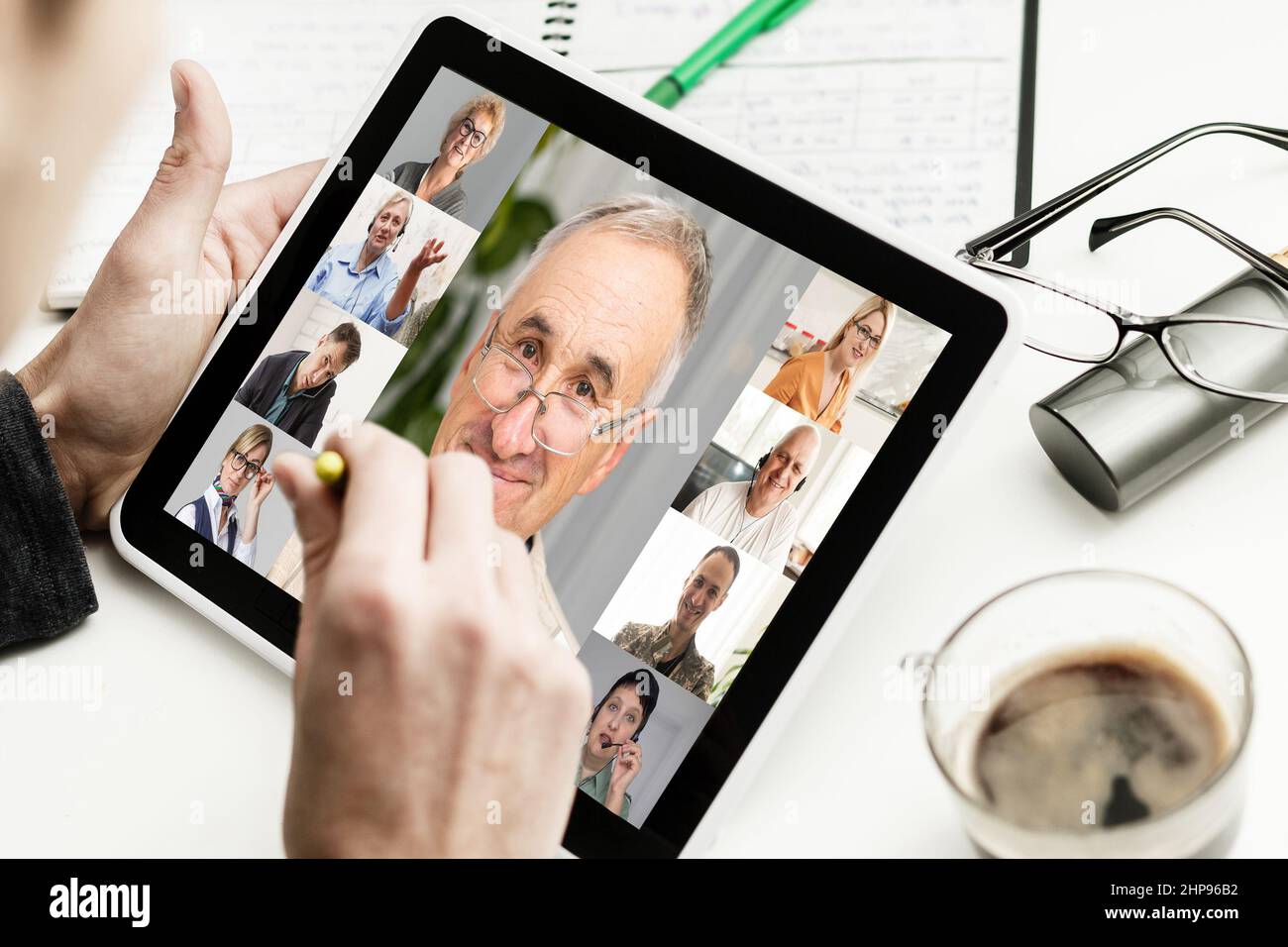 Closeup of a woman talking through video chat on tablet. communicating tablet in video chat through webcam. Stock Photo