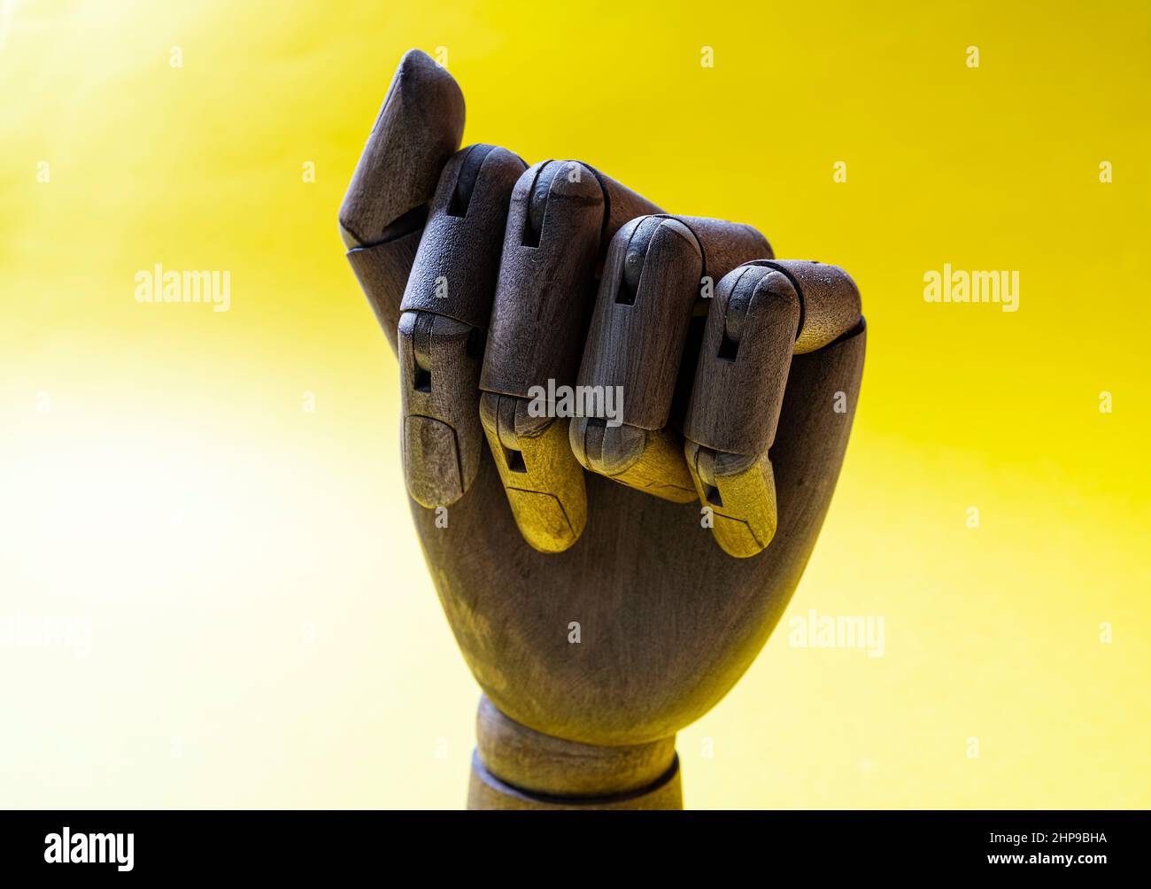 a wooden hand with a clenched fist Stock Photo Alamy