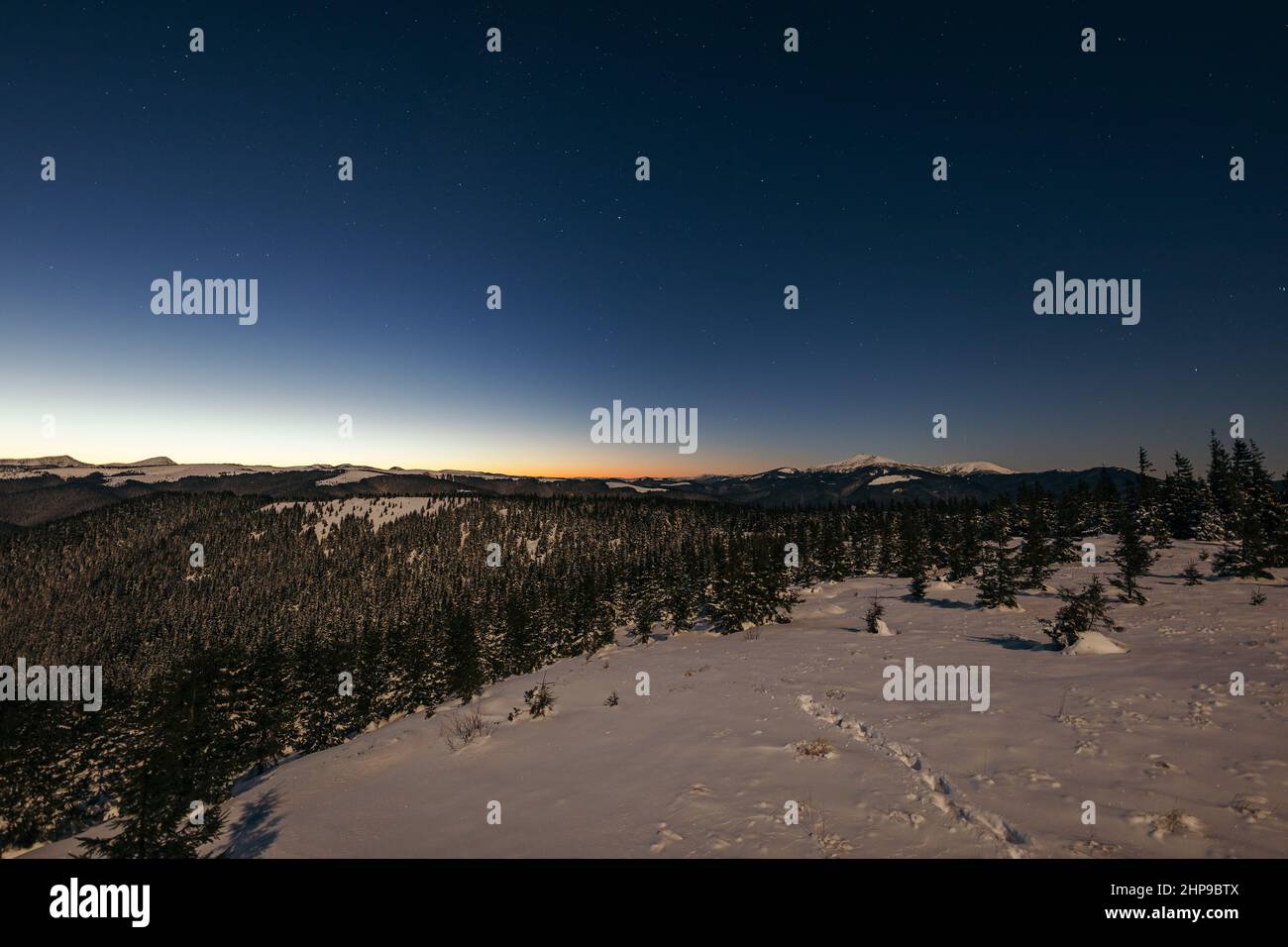 A sunset over a city Stock Photo - Alamy