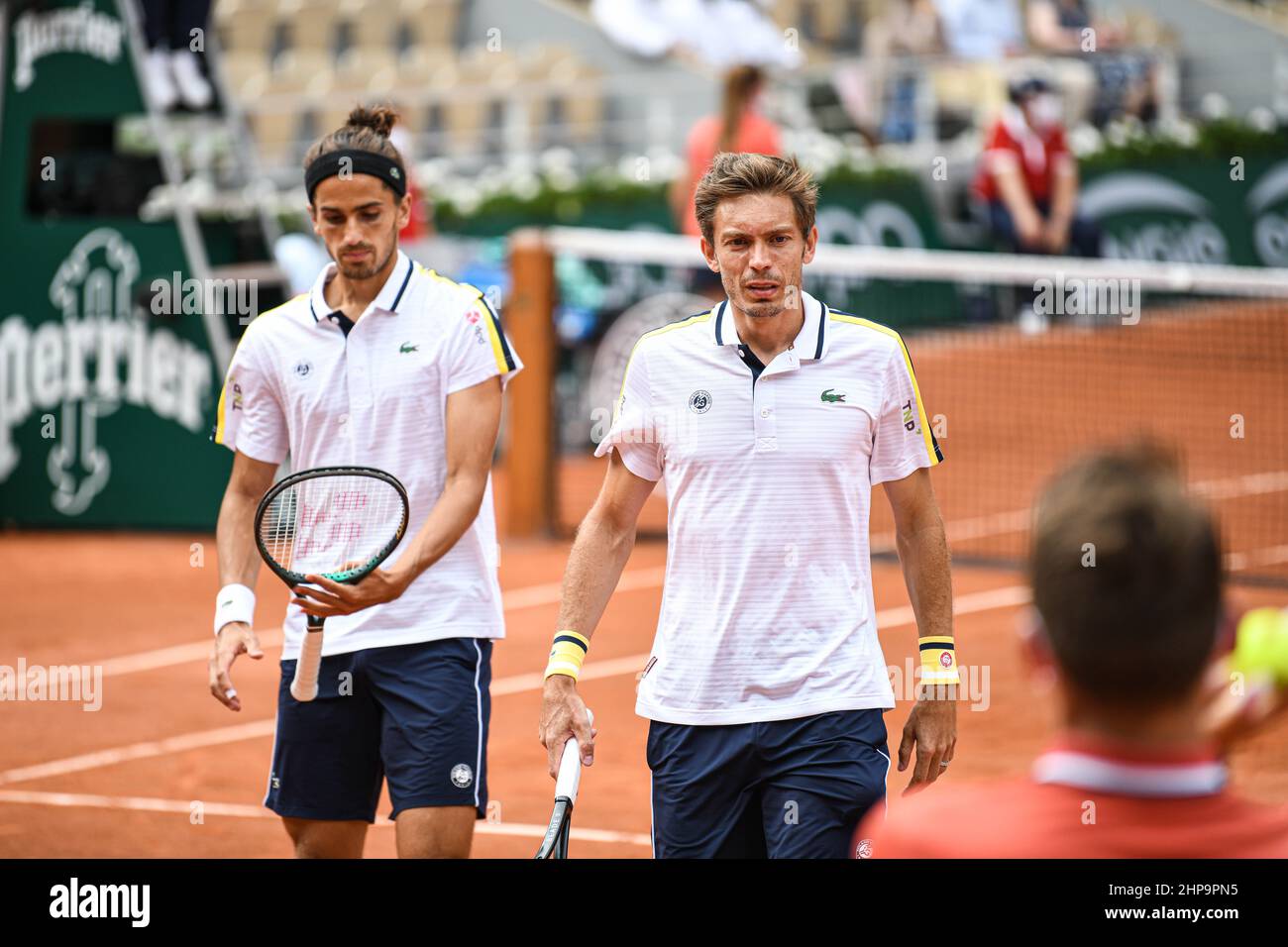 Nicolas Mahut (R) and Pierre-Hugues Herbert of France in action during the men's doubles final of the Roland-Garros 2021, Grand Slam tennis tournament Stock Photo