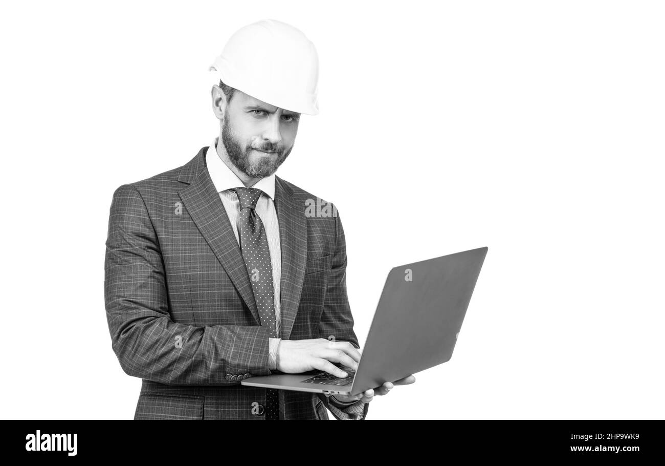 chief engineer in hardhat use computer. mature ceo checking email. serious man boss. Stock Photo